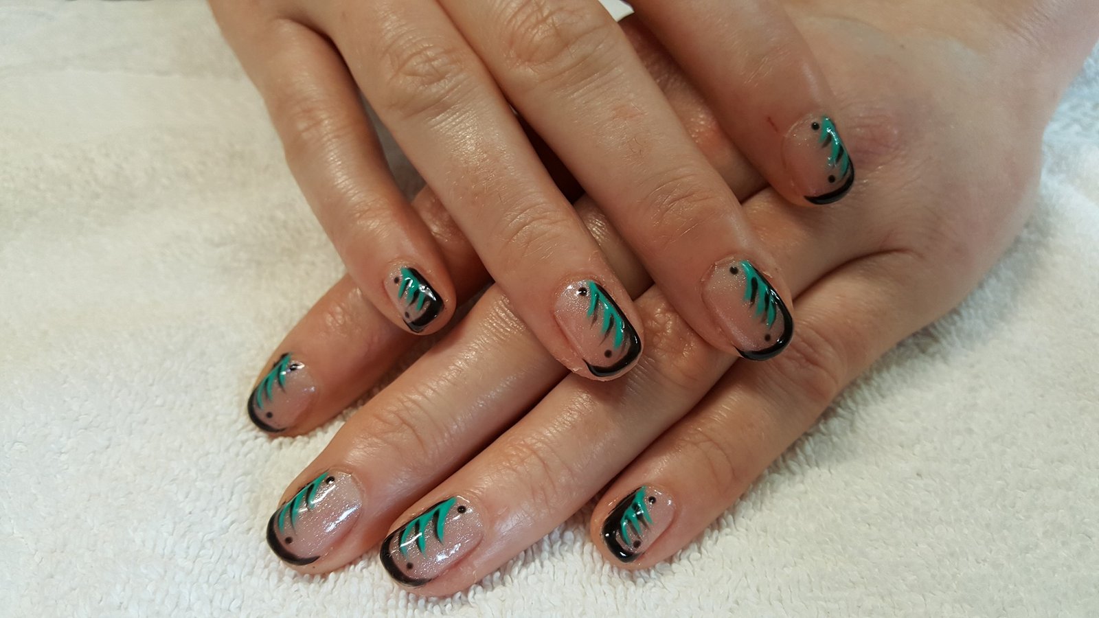teal and black nail art